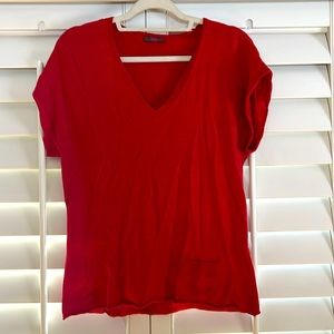 Wrap London Brand Short Sleeve Sweater with small pocket.